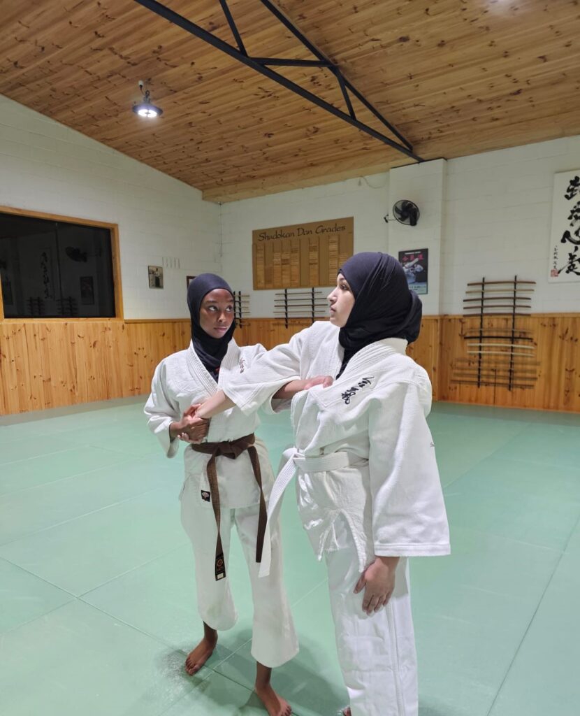 aikido shudokan womens self defense seminar muslim woman performing a martial arts technique