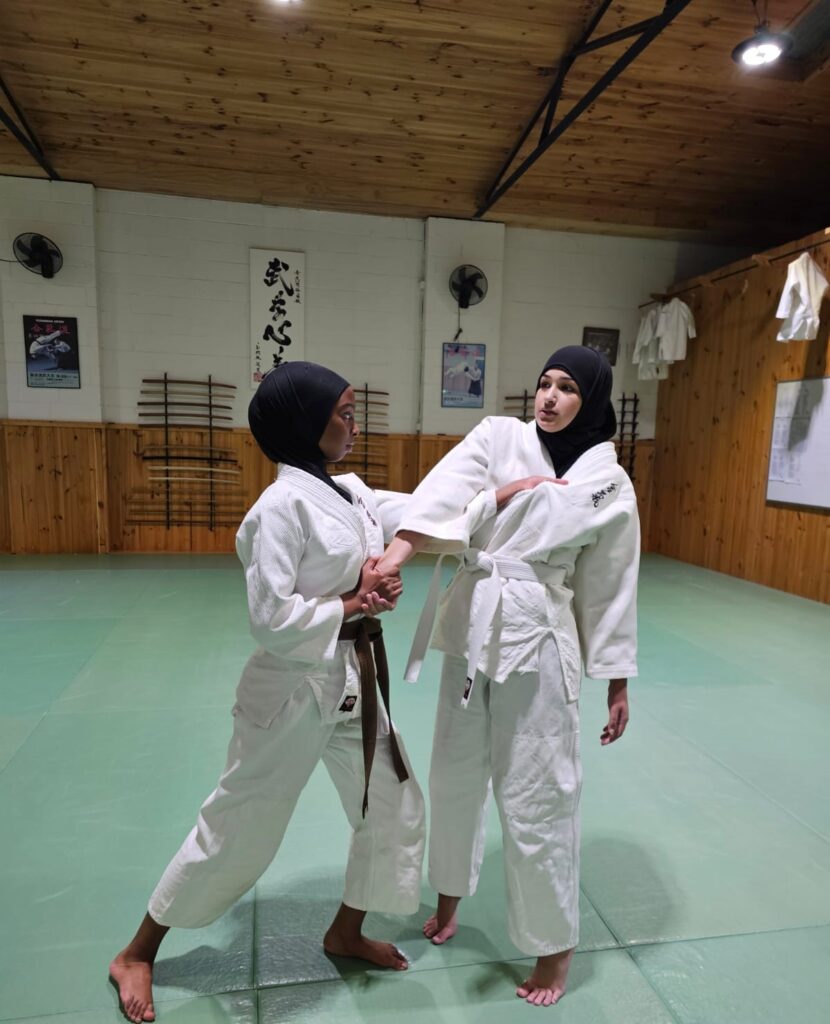 aikido shudokan womens self defense seminar muslim woman performing martial arts technique